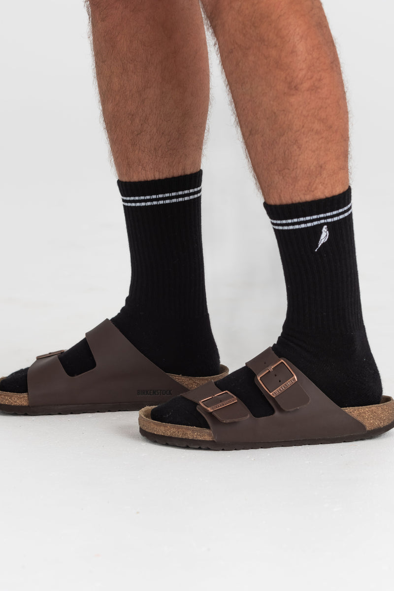 Sportsocken in schwarz mit Streifen und Logo
